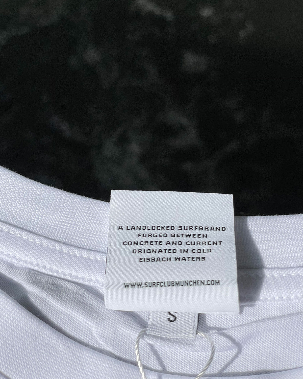 Surfing Is Not a Crime Big Logo T-Shirt — label detail